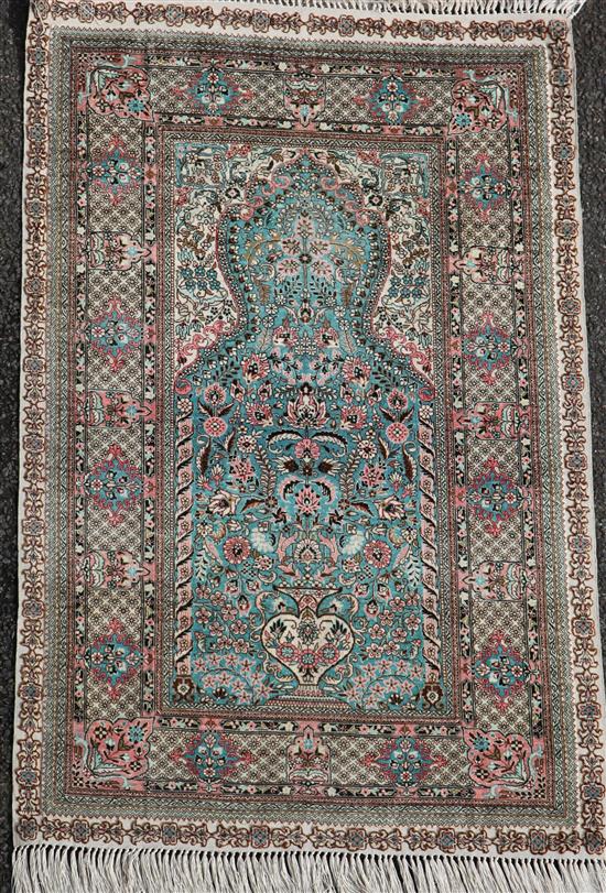 A Persian silk prayer rug, 4ft by 2ft 7in.